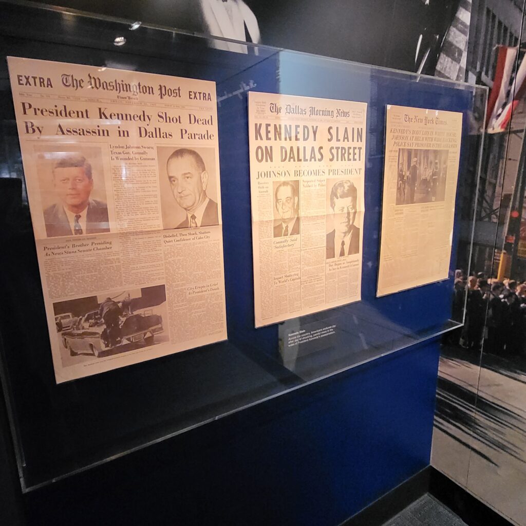 Newpaper clippings showing stories of President John F. Kennedy's assassination in Dallas, Texas.